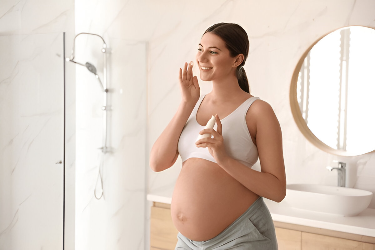 Pregnant woman practicing safe acne treatments during pregnancy